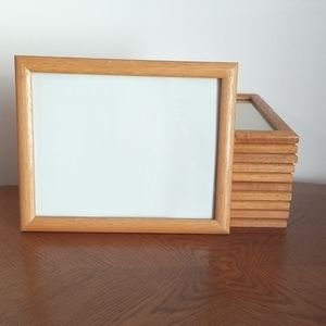 Set of 11 photo/certificate frames. See pictures for scratches.